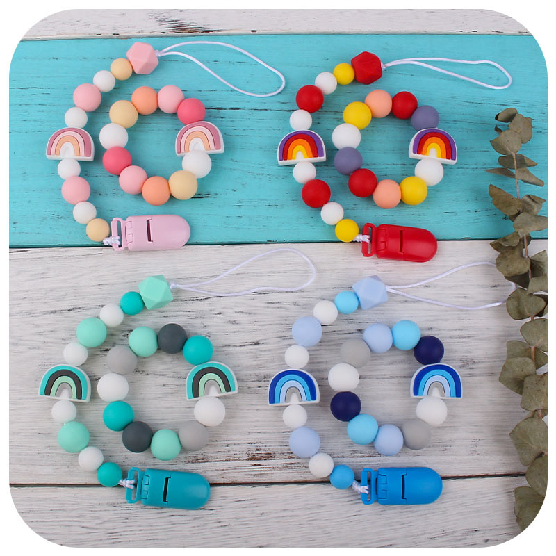 Nuevo bebé de dibujos animados colorido rojo pulsera de silicona teether palo pezón cadena anti-caída cadena juguete teether