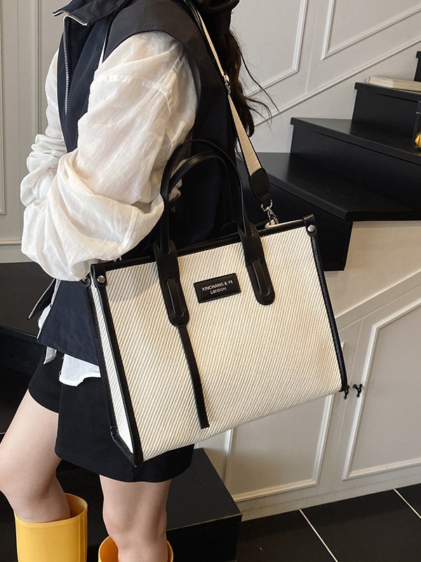 Bolso de gran capacidad para mujer 2025 verano nuevo estilo moda contraste color costura mensajero bolso simple de viaje