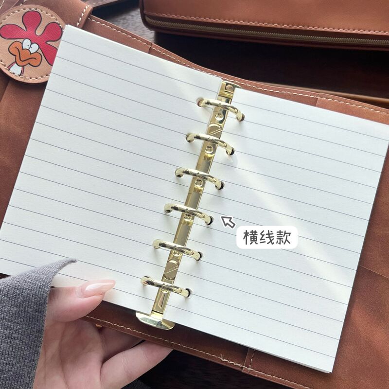小紅の本の同項のスヌーピーm 5手の帳簿はページの本のinsの風の高い顔の値の皮の日記のノートを取り外します。|undefined