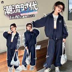 女の子の春秋は新しい現物の女の子の大きい子供のスーツを詰めます。