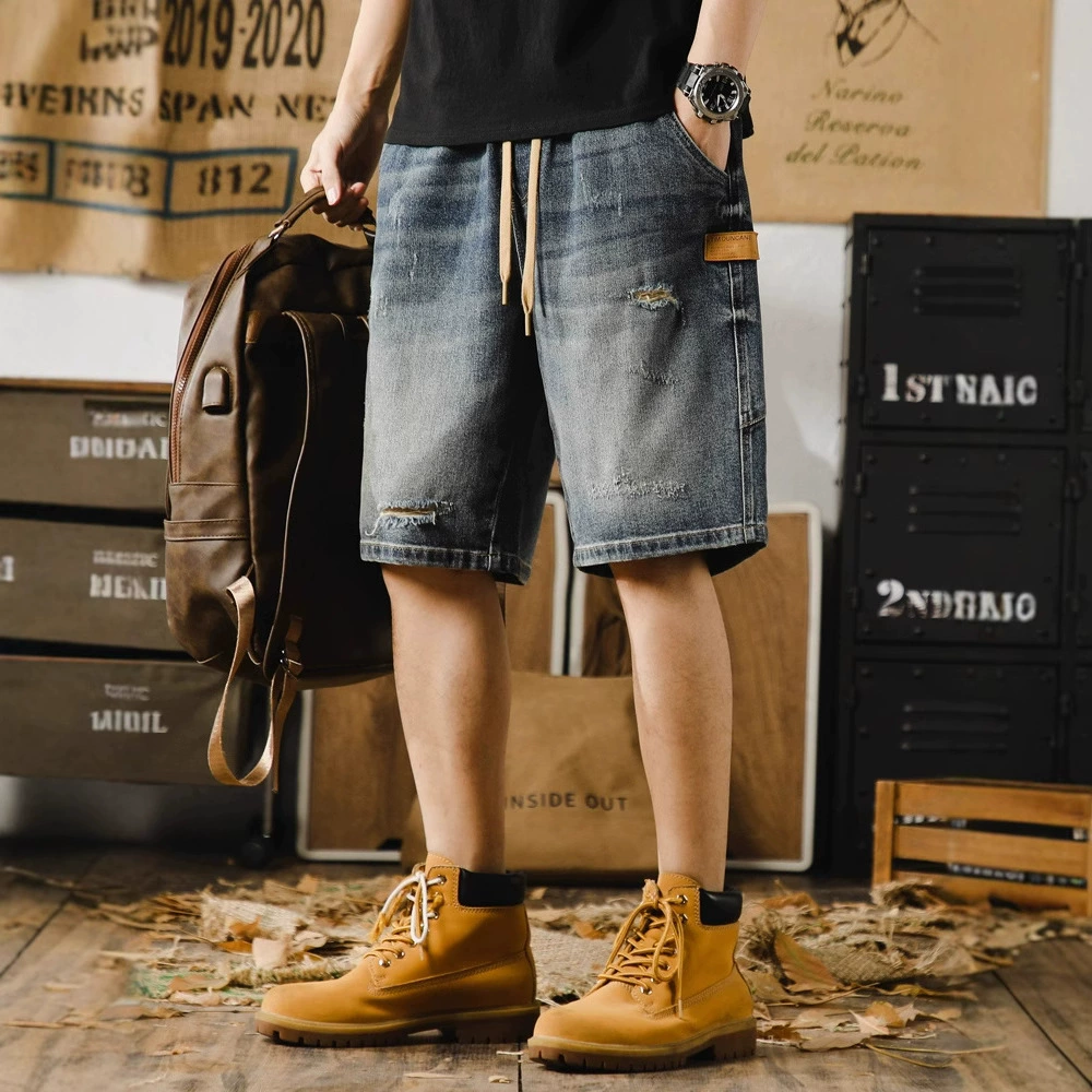 Модные джинсы со средней талией и легкой растяжкой, молодежные и популярные брюки с пятью точками, летняя мода, рваная молния, мужские свободные прямые брюки.