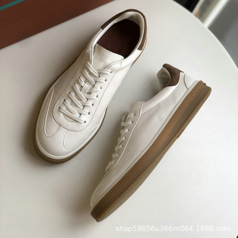 高品質のイタリア製軽量高級本革スポーツとレジャーのドイツのトレーニングシューズ、男性と女性用、カップル用の同じスタイルの白い靴|undefined