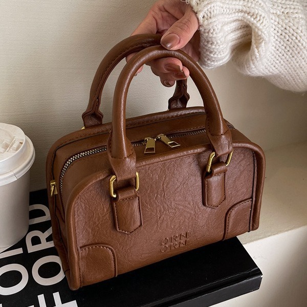 2024 New Maillard Retro Small Pillow Bag Women's Autumn and Winter Trend Korean Handheld Small Square Bag Versatile Crossbody Bag_voghion.com