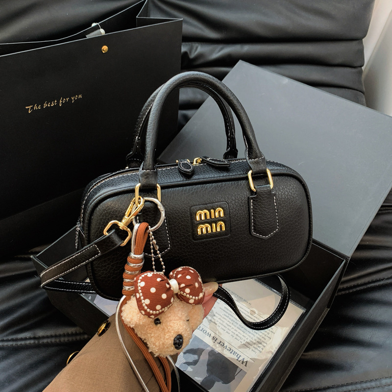 Bolsa de bolos portátil retro para mujeres 2026 nueva moda diaria sensación de bolso cuadrado bolso de hombro universal