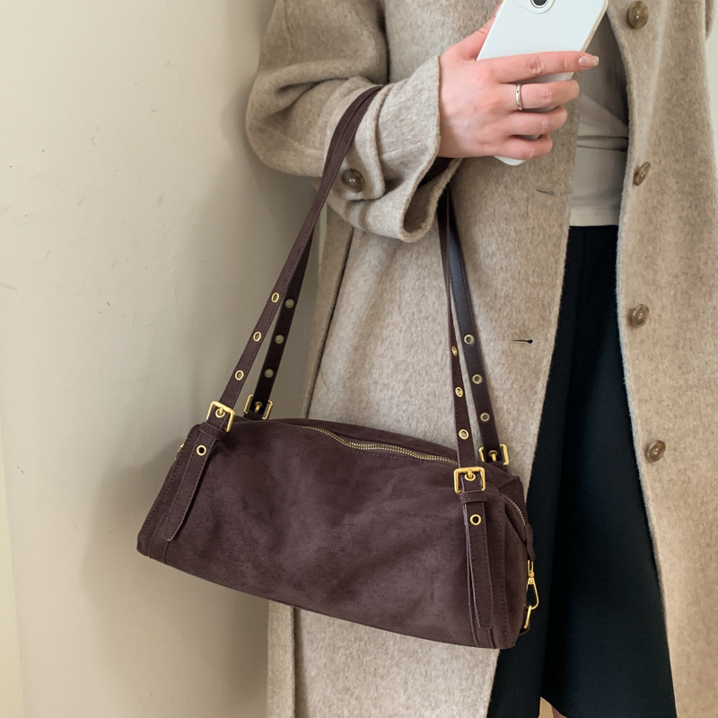 Otoño e invierno lazo bolsa de viento para mujeres 2025 nuevo retro cuero blando hombro brazo bolso de almohada de viaje bolso de mano