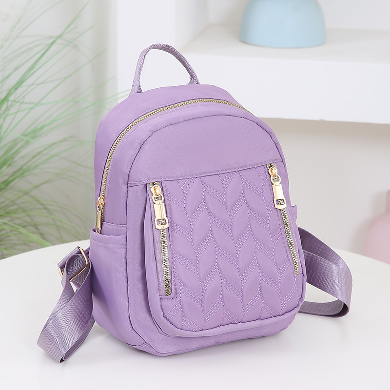 Mochila de moda transfronteriza para mujer, nueva mochila casual de rombo simple, bolsa de tela de color sólido de tendencia coreana al por mayor