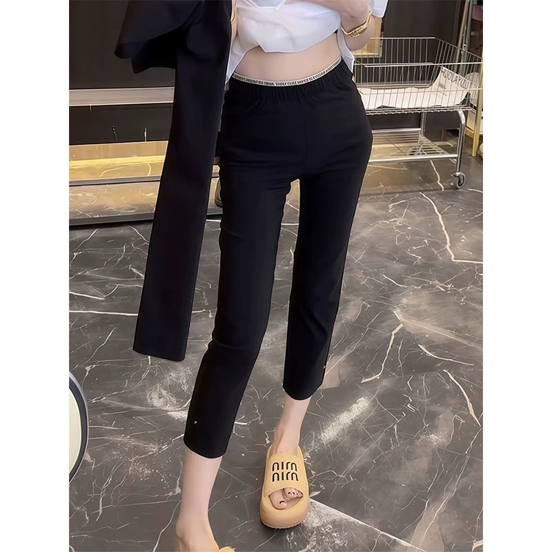Летние тонкие брюки из нового эластичного материала с быстрой сушкой, черные, для женщин 2025, универсальные укороченные утягивающие брюки-сигареты для повседневной носки.