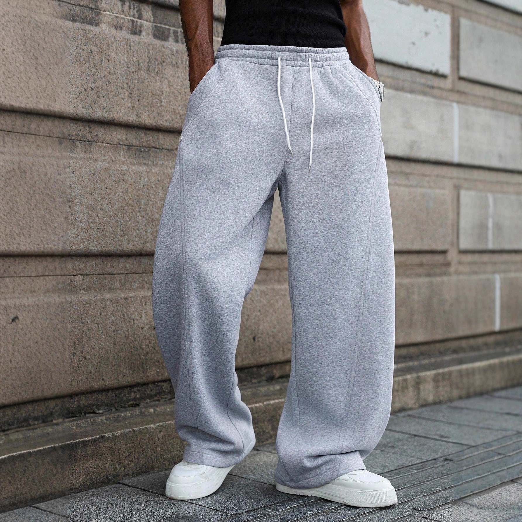 Comercio exterior transfronterizo Europa y América ropa de hombre Amazon para aliexpress cuerdas de dibujo sueltas pantalones de cuchillo de abrigo de tamaño grande en stock