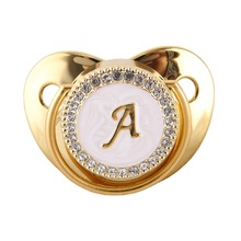 跨境爆款26字母金色金属字婴儿安抚奶嘴钻石母婴用品热卖