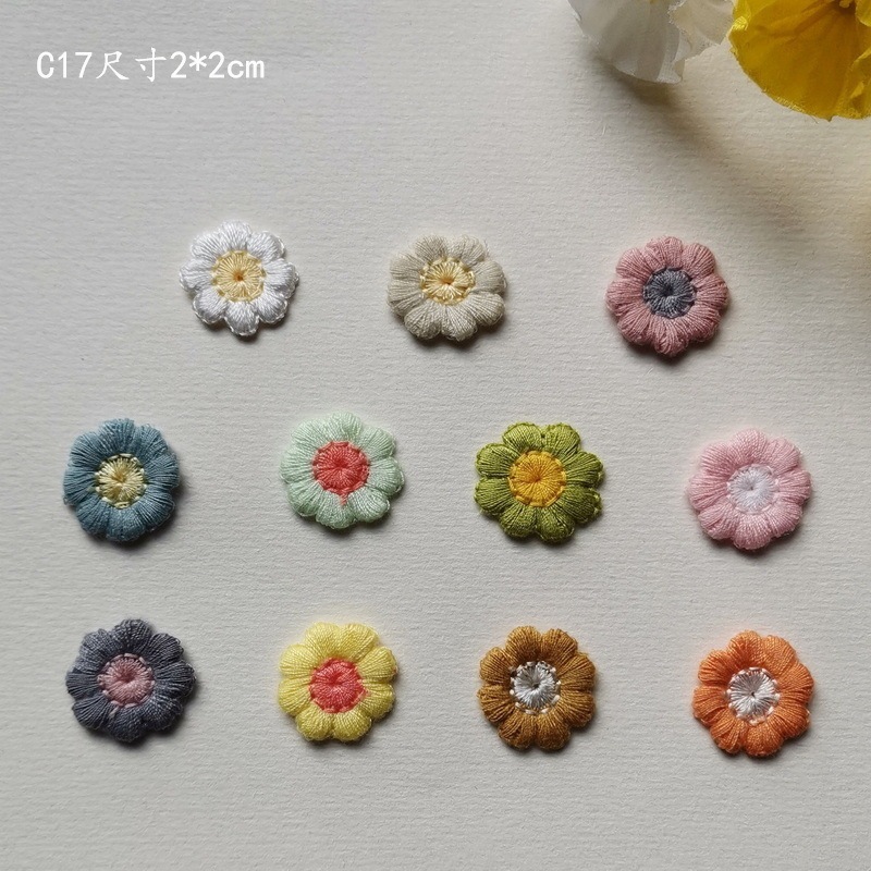 Spot wholesale Korean version of wool decorative cloth phone case embroidery bag hairpin accessories woven flowers