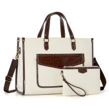 跨境新款手提包高端帆布包拼皮革包多功能大容量记忆本电脑手提包