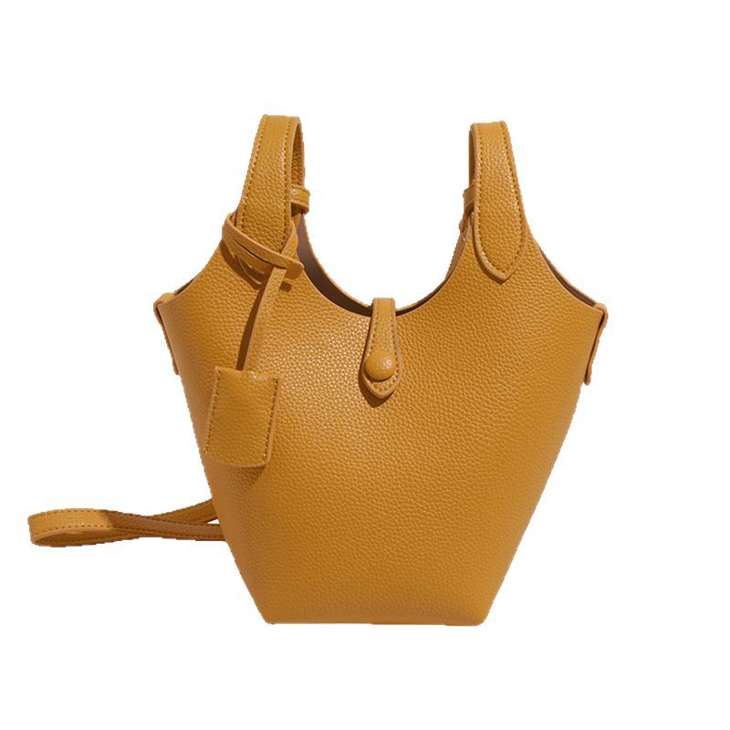 Bolso de cubo de canasta de verduras portátil de gran capacidad de alta calidad para mujer 2025 nuevo bolso de mensajero de hombro de estilo occidental de todo fósforo de moda