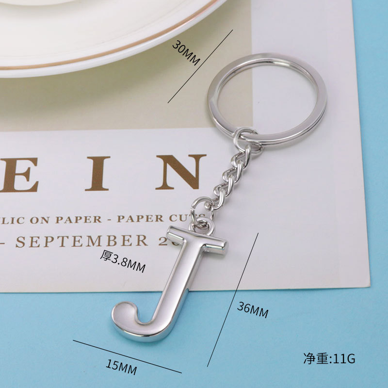 Inglés carta llavero bolsa colgante 26 letras mayúsculas y minúsculas y números llavero europeo y americano pequeño regalo personalización