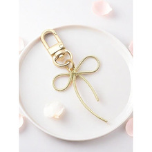 E 39658 Bow keychain pendant ������Կ�׿ۿ羳����ͨ����