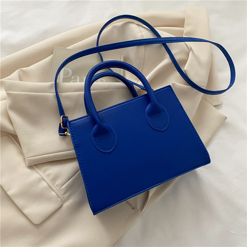 2024 primavera Nueva Bolsa cuadrada pequeña bolsa de estilo coreano de moda de este año de color sólido mini bolso de las mujeres