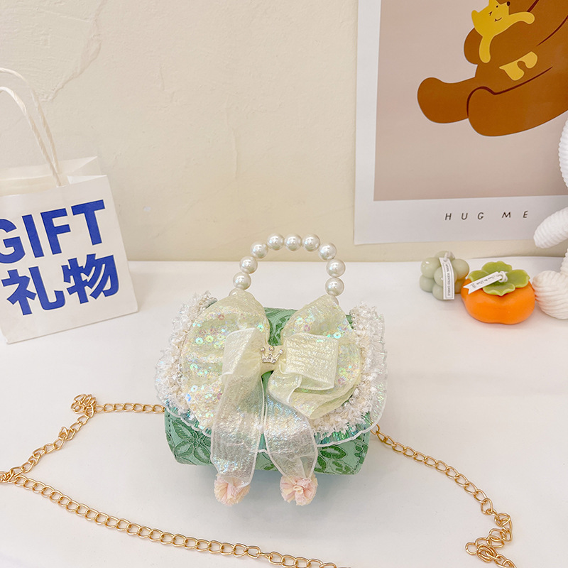 Bolso infantil de perlas 2024 nueva chica arco de moda, bolsa de tramo inclinada, princesa de moda, accesorios de algodón y lino, bolso