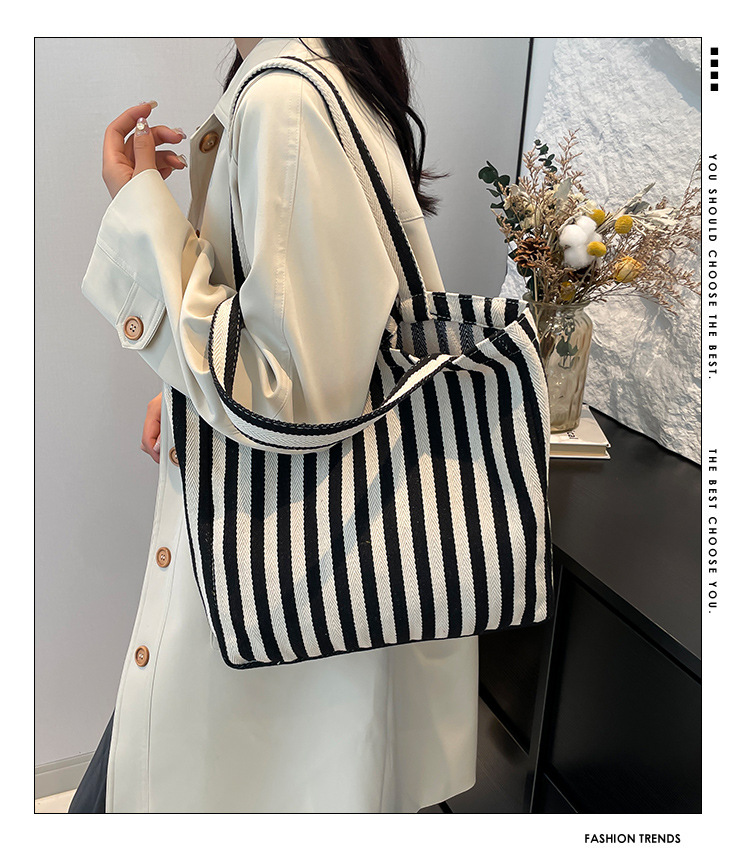 2024 Autumn/Winter new versatile and fashionable striped handbag shopping bag, two-tone large-capacity trendy single-shoulder bag details Picture