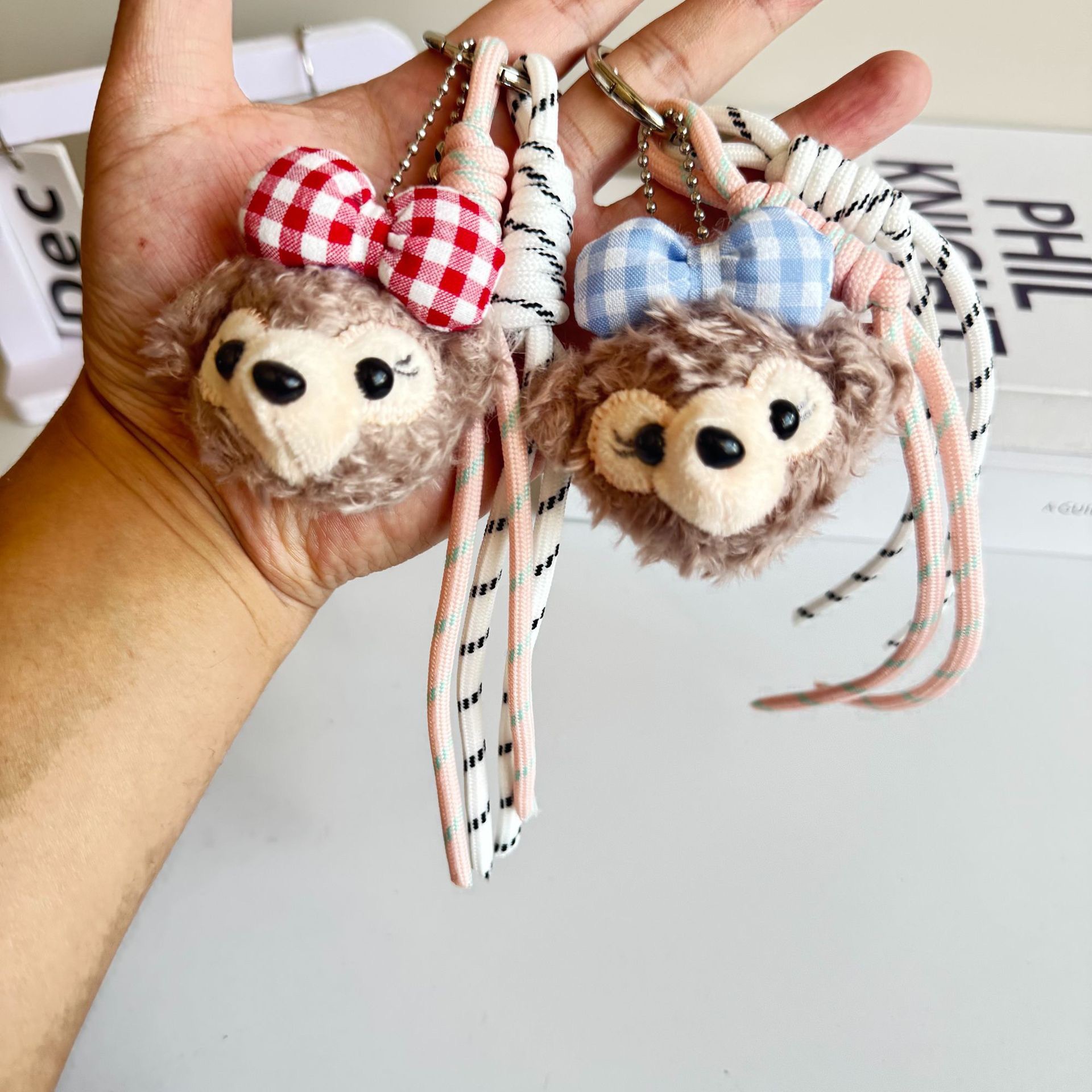 Adorable muñeca de peluche colgante llavero de dibujos animados Bell tejido colgante de cuerda decoración arco colgante de bolsas