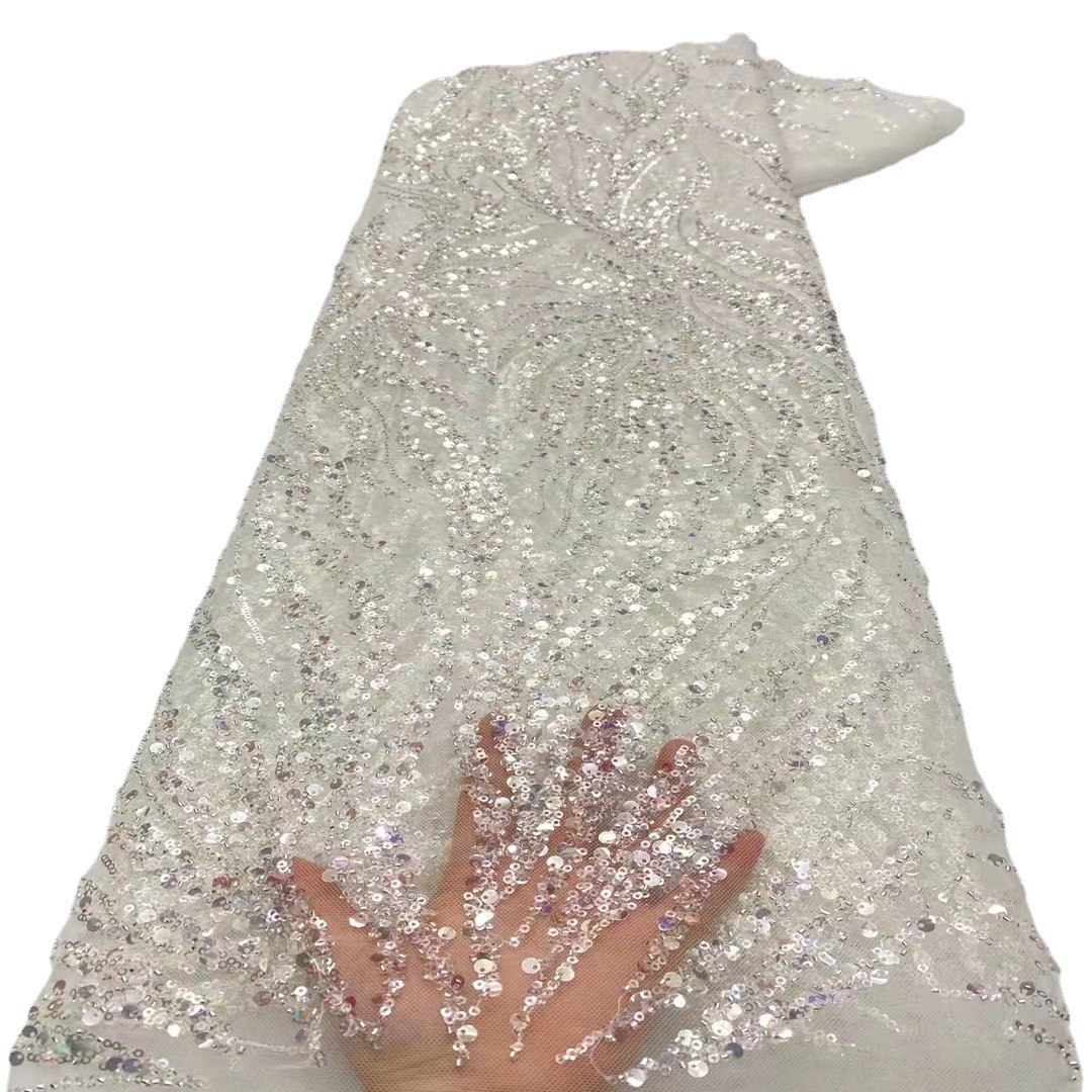 Tela de encaje de tubo de cuentas teñidas tela europea y americana irregular gran máquina bordado vestido de novia tela con cuentas JX1949