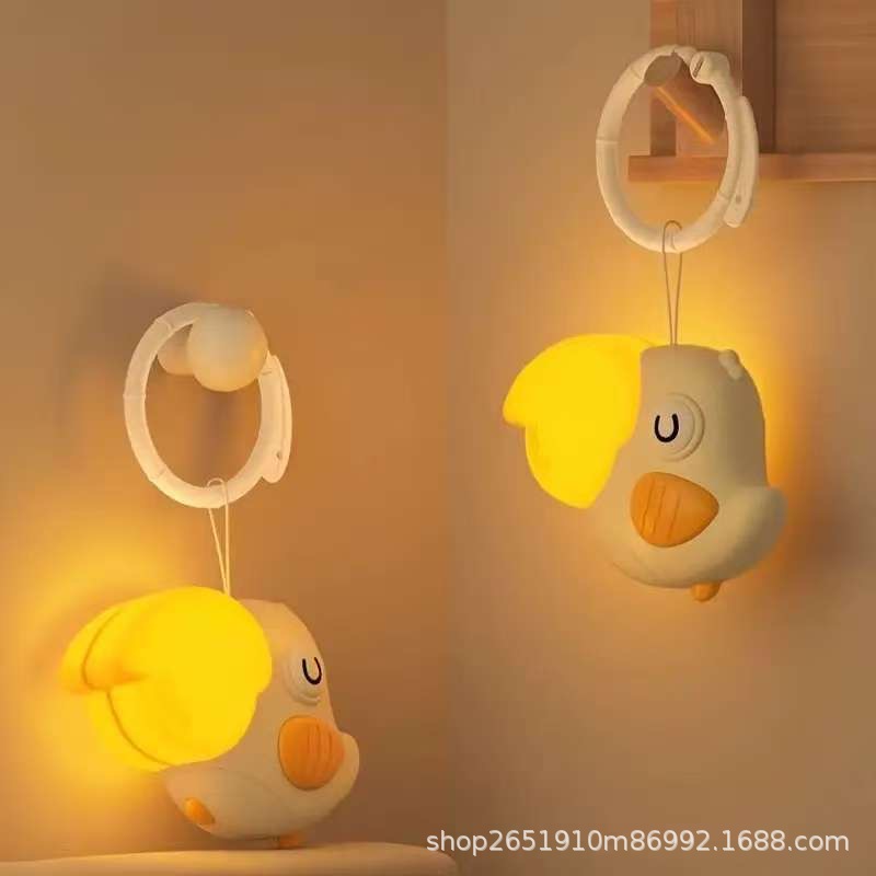 Clip de campana de cama para bebé transfronterizo, adornos de iluminación giratorios de música, cama de clip para bebé recién nacido, juguetes colgantes de campana de cama colgante