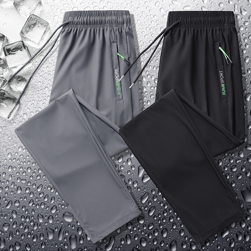 Pantalones deportivos casuales de seda de hielo para hombres pantalones de verano finos de punto de oro elásticos de secado rápido casuales atados al tobillo más pantalones de tamaño