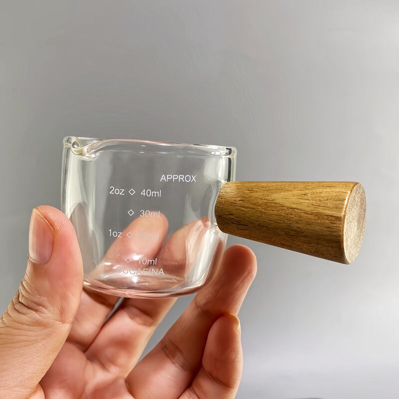 木の柄のミルク缶の小さいミルクの瓶のミルクの瓶のエスプレッソの目盛りの計量カップのコーヒーとミルクの杯のミニの調味料の計量カップ|undefined