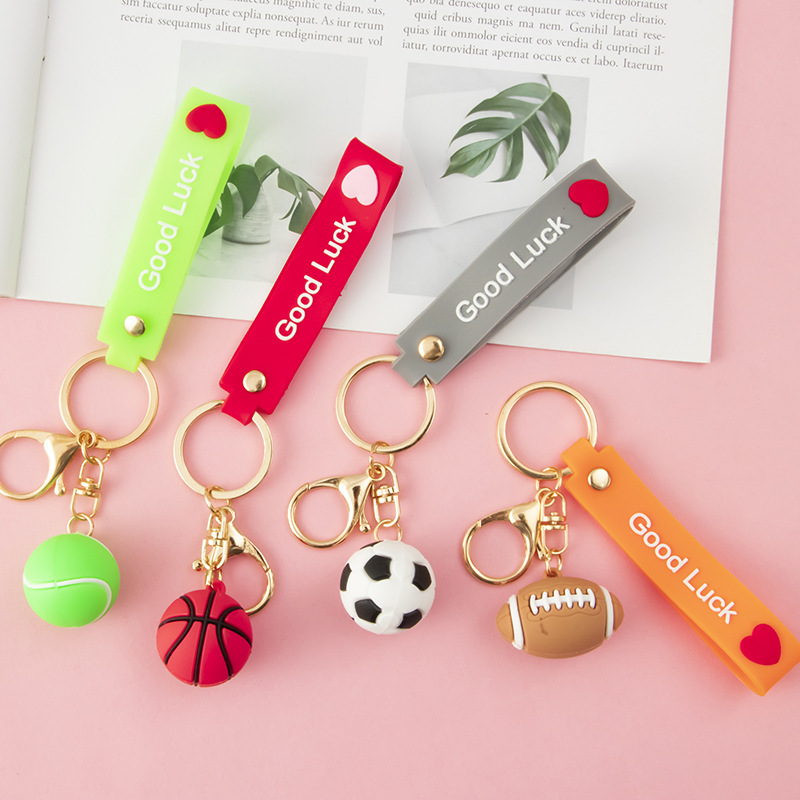 Three dimensional football basketball keychain