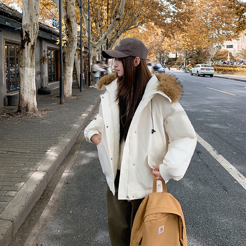 Trajes de moda de algodón de mujer otoño y invierno 2025 nuevo engrosado suelto chaqueta de algodón con capuchón de moda de mujer