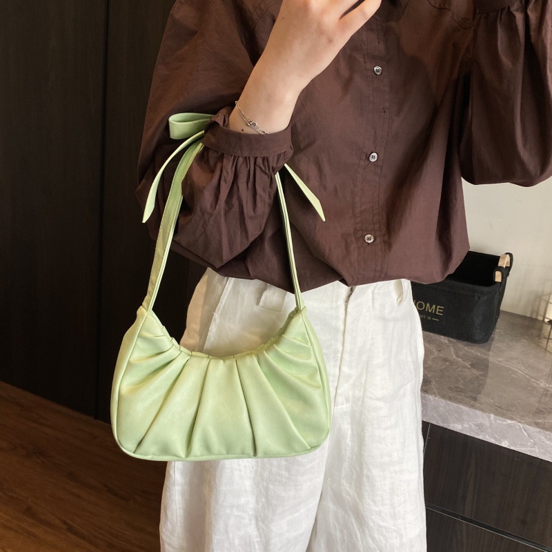 Bolso de axila popular de este año 2025 primavera y verano nuevo bolso femenino lindo bolso de lazo bolso de hombro plisado de moda