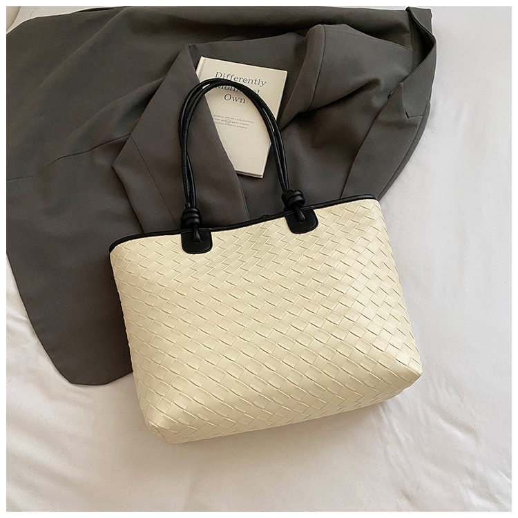 Bolso de patrón tejido de gran capacidad Bolso de hombro de cercanías de moda transfronteriza para mujer Bolso de tote de todo fósforo casual de alta gama