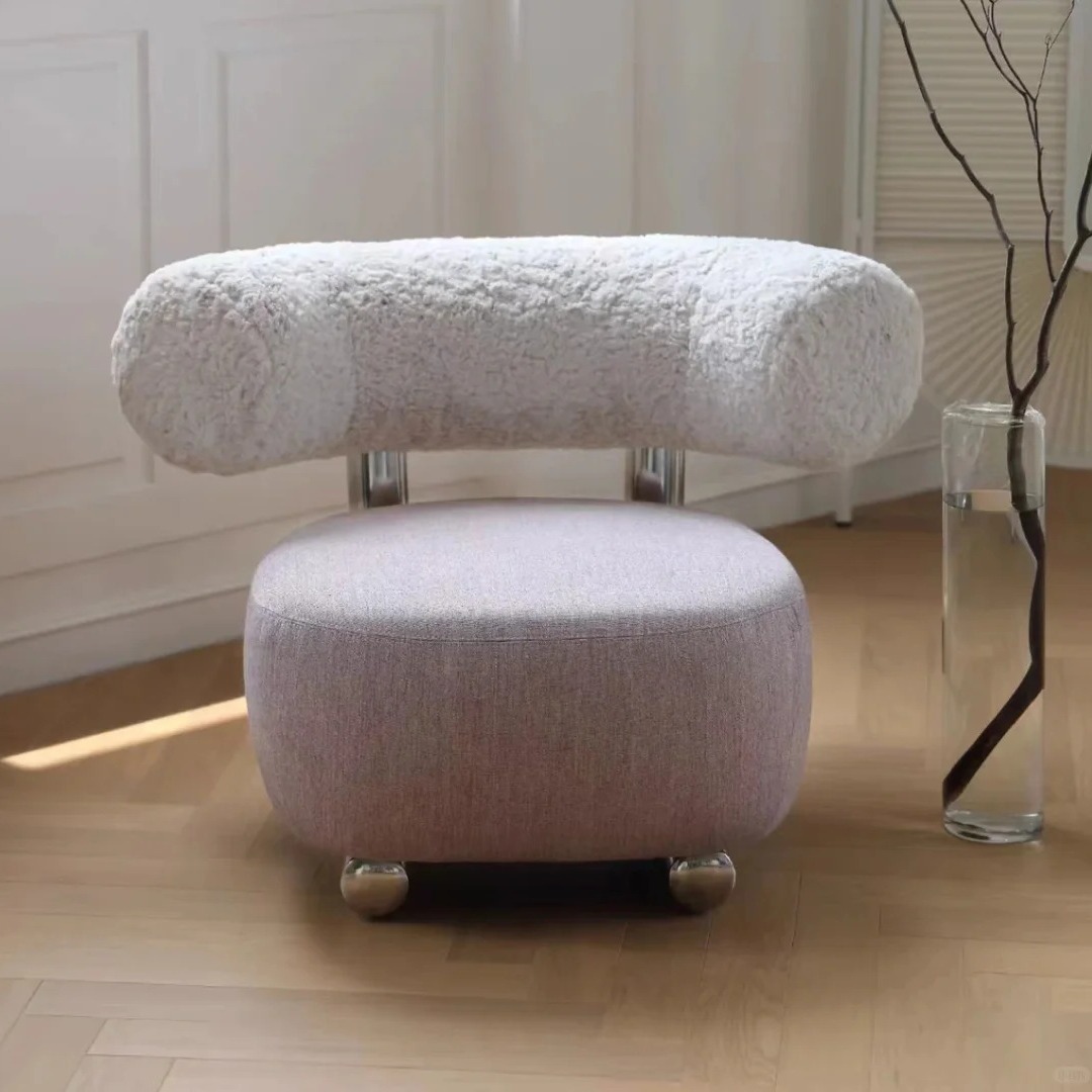 Nordic light luxury retro sofa chair with Wabi-sabi style, designer stainless steel single chair, Instagram popular sled back chair