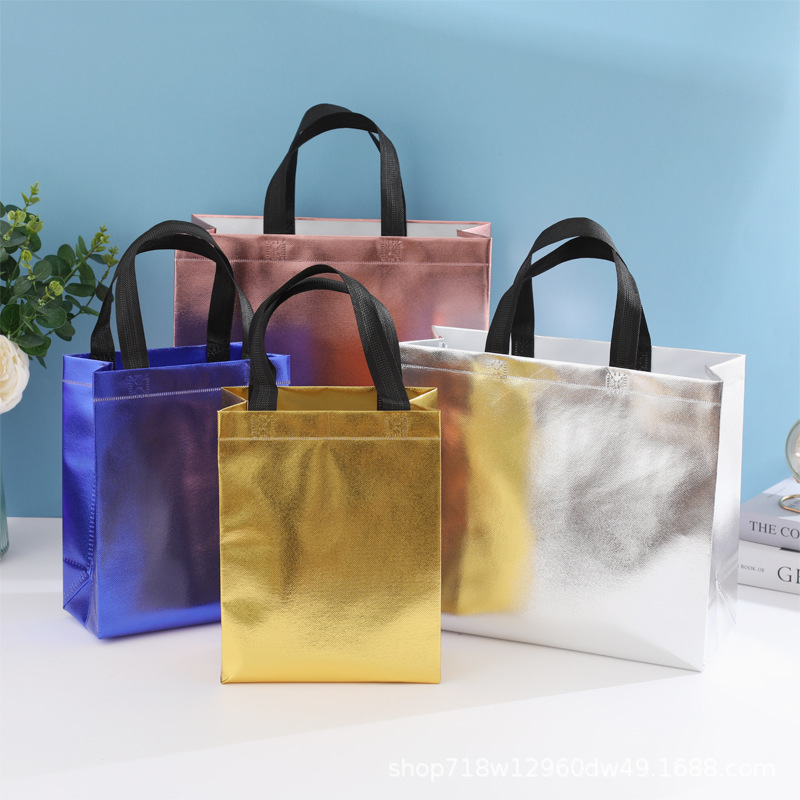 En stock nueva bolsa de regalo no tejida láser bolsa de regalo de boda bolsa de fiesta de comercio exterior logotipo imprimible
