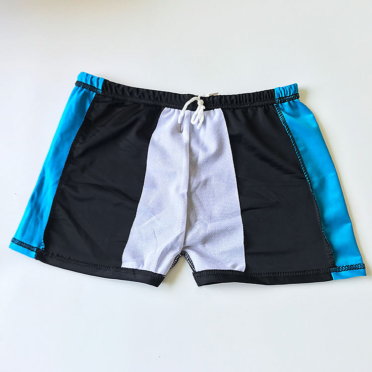 Nuevo poliéster mediano y grande gordo de baño los niños estudiante lindo color a juego shorts niño boxeador bañador al por mayor