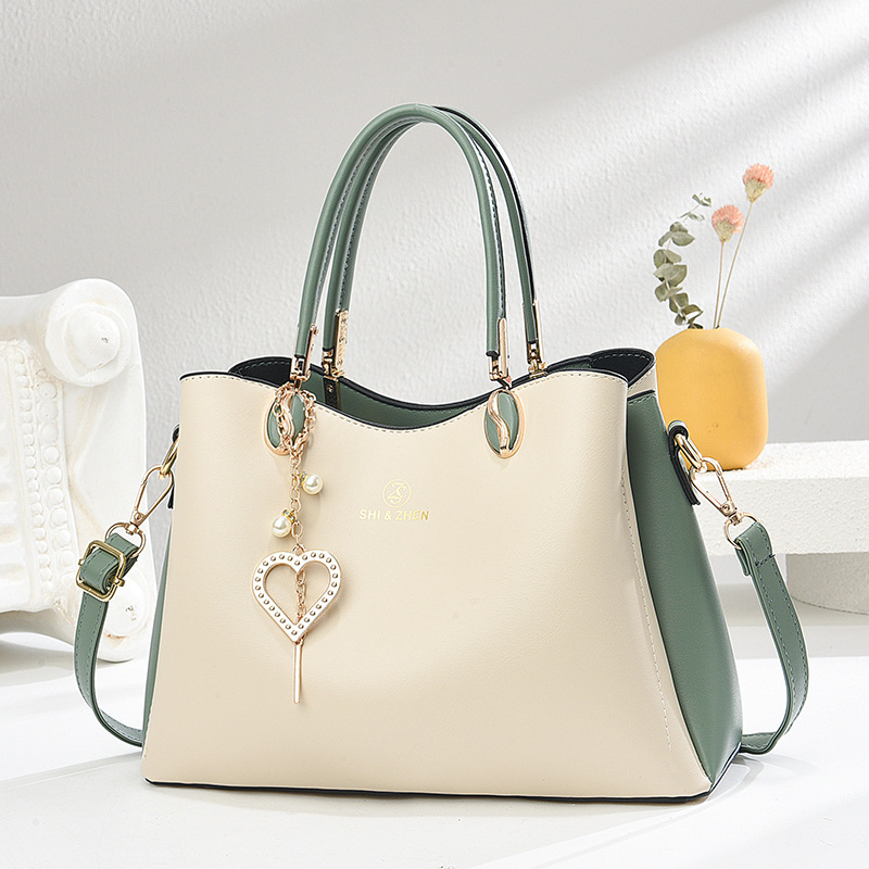 Bolso de moda simple bolso grande primavera y verano nuevo bolso de mensajero de un solo hombro salvaje estilo coreano bolso de mujer de mediana edad bolso de madre