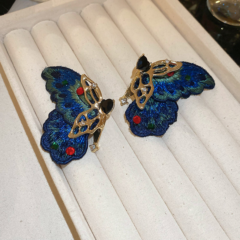 Pendientes de mariposa azul con bordado de aguja de plata Pendientes de estilo antiguo de personalidad europea y americana Pendientes de lujo ligero exquisito de alta calidad