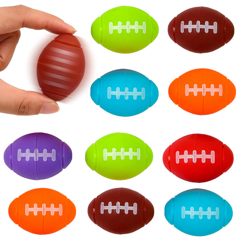 跨境热销橄榄球指尖陀螺篮球足球旋转解压发泄压力球减压手指玩具