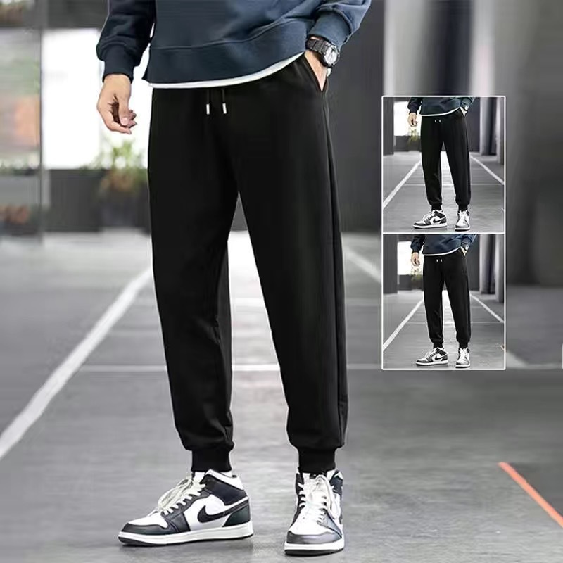 Pantalones de chándal forrados de lana de primavera y otoño para hombres de color sólido rectos delgados estilo coreano popular ins populares Pantalones deportivos casuales comercio exterior