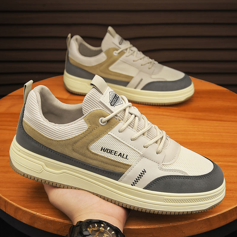 Zapatos de hombre invierno 2026 nuevo estilo ventilado puerto viento versátil anti-sucio zapatos de malla de moda ligero con suela suave zapatos deportivos casuales