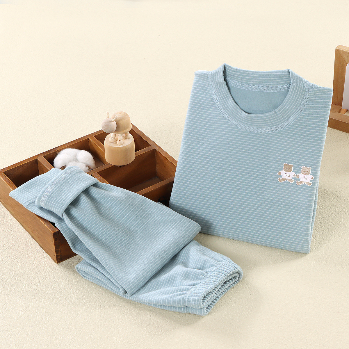 Niños sin hueso de ternero de cuello alto nuevo abrigo de otoño conjunto de pantalones de oro para hombres y mujeres estriado conjunto de ropa interior cálida