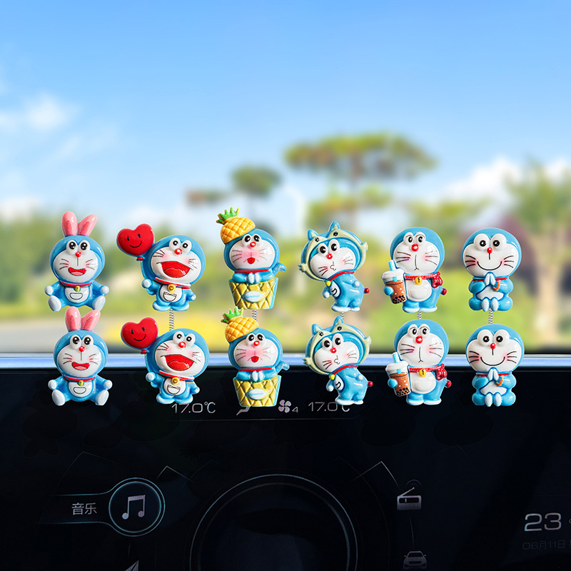 Nuevo lindo Doraemon decoración de coche creativo consola central de coche decoración de espejo retrovisor eléctrico interior