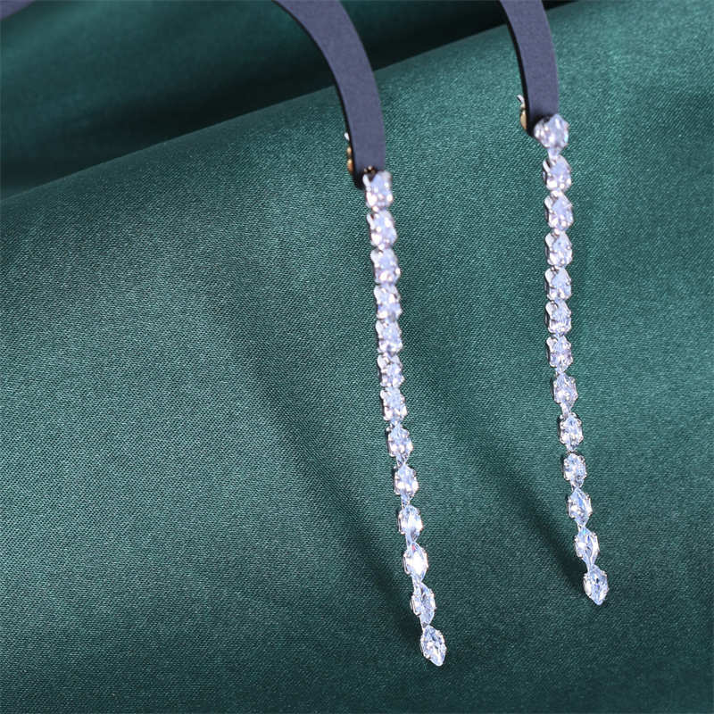 Fashionable summer earrings with zircon