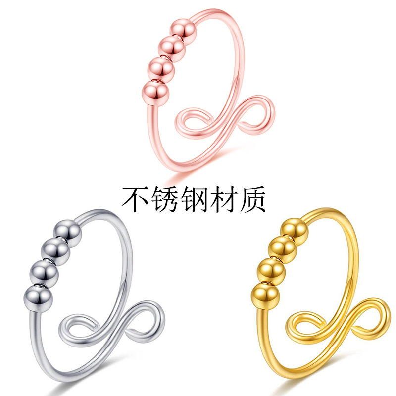 Amazon caliente micro perlas giratorias cuentas redondas anillo de ansiedad perlas anillo de descompresión anillo abierto de acero inoxidable