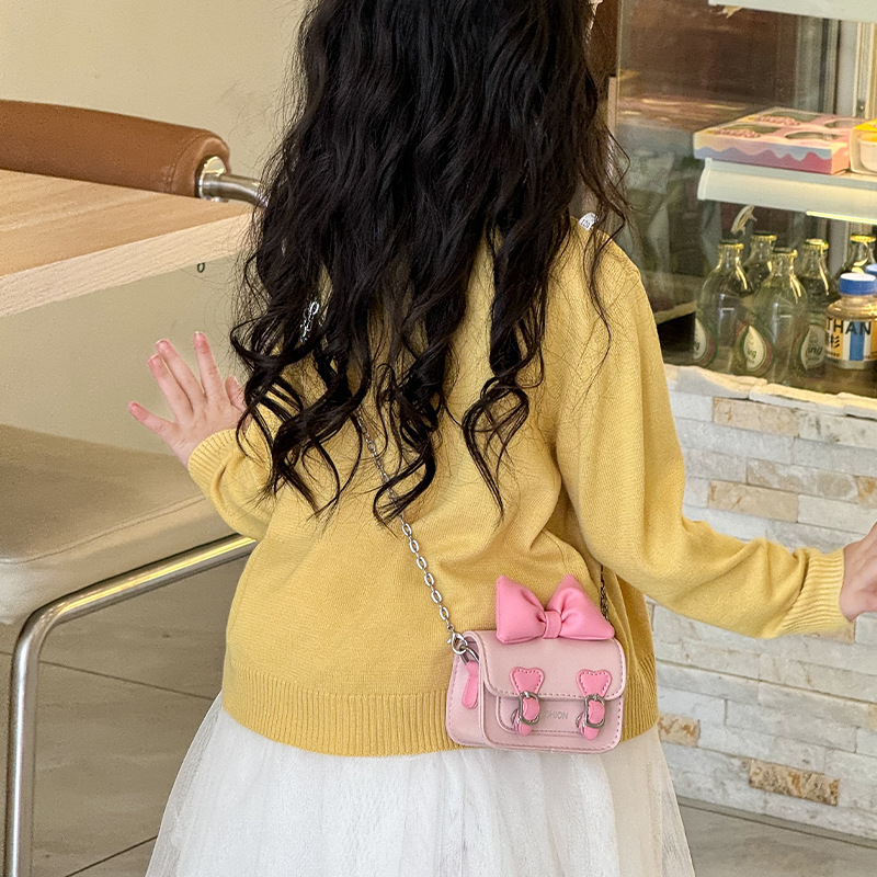 Versión coreana del bolso de hombro para niña con fragancia pequeña, bolso de mensajero para bebé con lazo lindo, bolso para niños con mini cadena de color sólido
