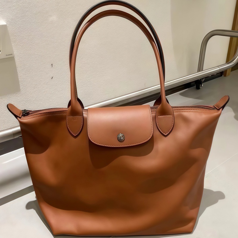 高品质新款小牛皮中号长柄饺子包女大容量单肩包妈咪包手提通勤包|undefined