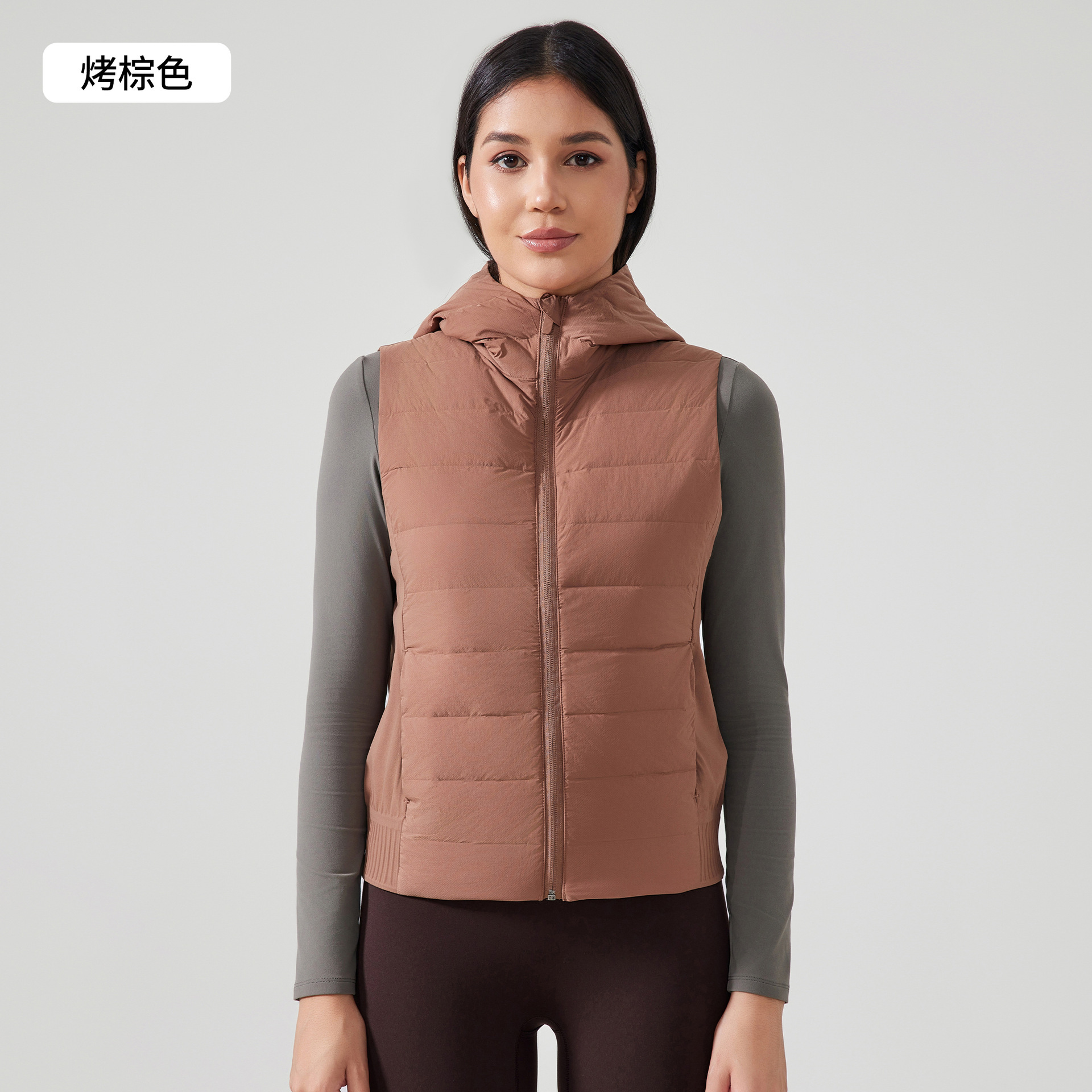 Exportación de comercio exterior Europa y América chaleco de pluma con capuchón caliente ligero de moda universal hombro deportivo de bicicleta chaqueta de fitness