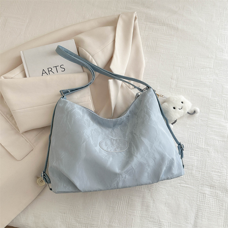 Bolsa de sensación relajada, bolsa de mujer, gran capacidad de verano, 2024, nueva bolsa de viaje de hombro de un solo tipo