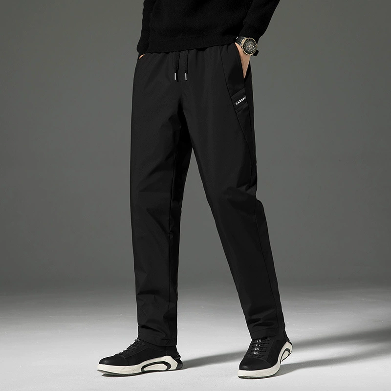 Зимние пуховые брюки могут быть открыты для мужчин и красивых свободных больших размеров толстые на открытом воздухе теплые белые утка пух сплошные повседневные брюки