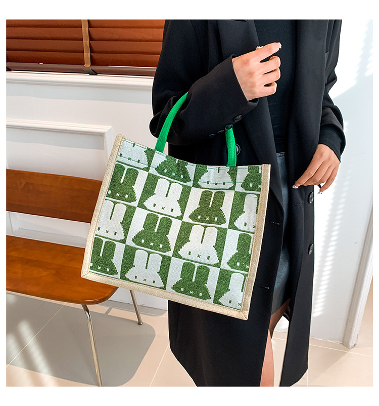 High-end mid-capacity canvas school commuting handbag 2024 new style fashionable and versatile linen single-shoulder tote bag undefined