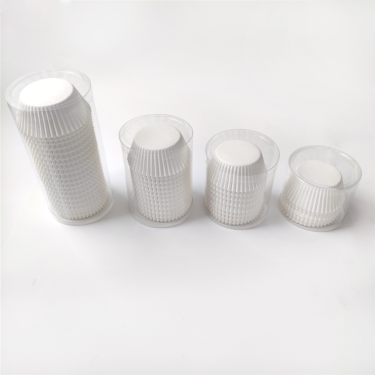 Fábrica directa al por mayor 100% taza de papel de pastel blanco puro 100 barril de papel de horneado resistente a altas temperaturas papel de pastel a prueba de aceite