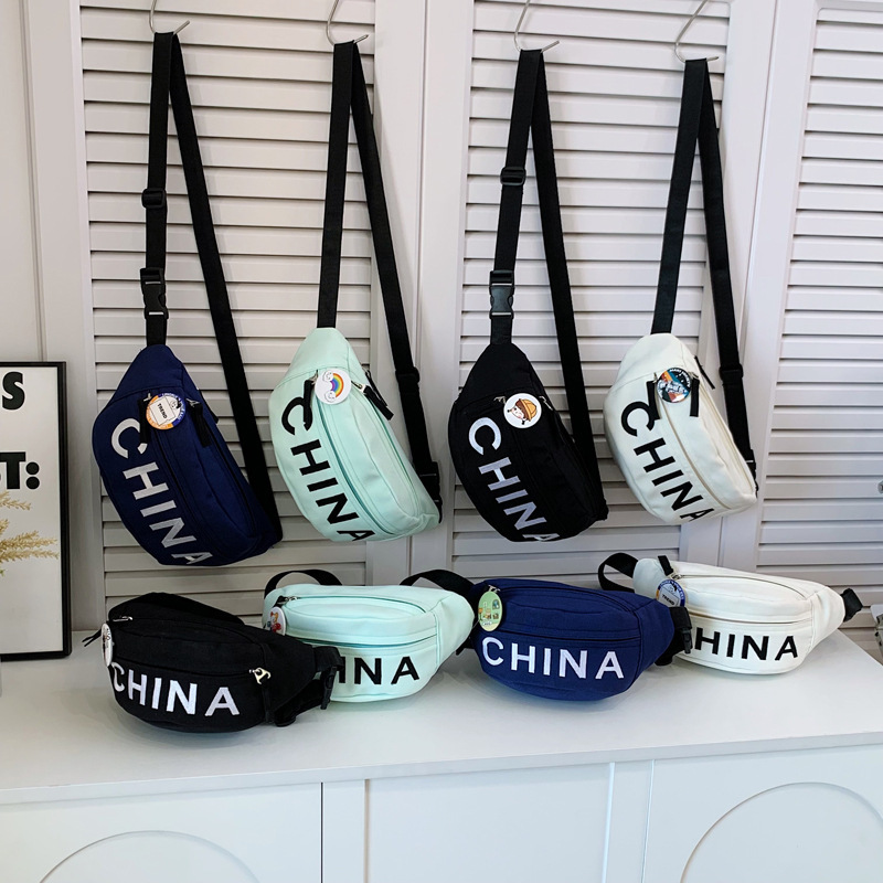 Nuevo tipo de bolso infantil estilo coreano de moda letras bolso de mochila para hombres simple de alto valor de belleza bolso de pecho ligero